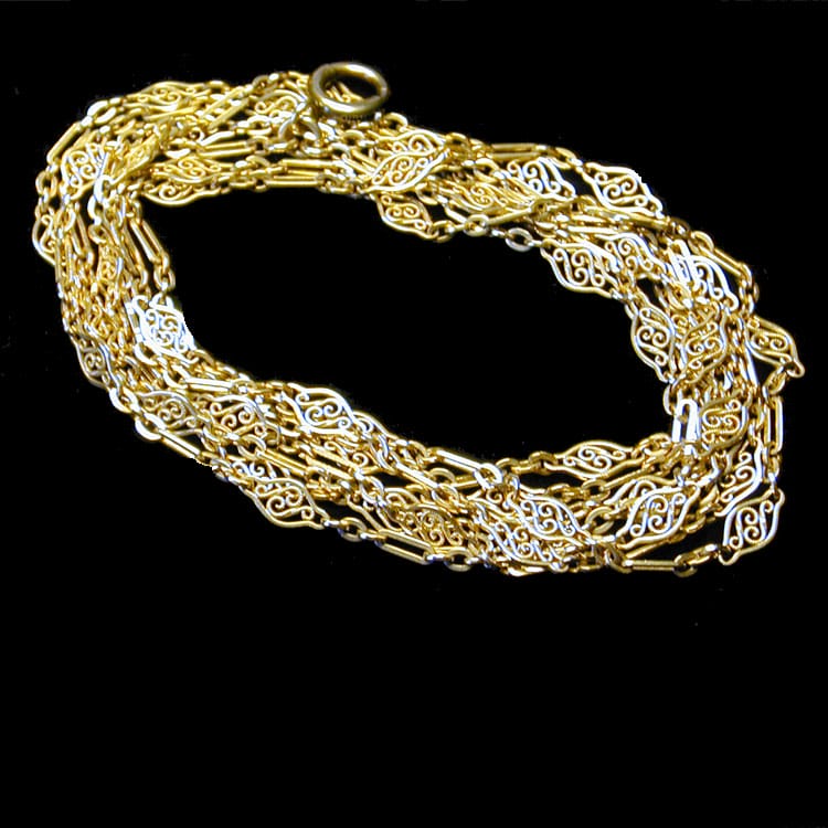 A Long Yellow Gold Fancy Link Guard Chain