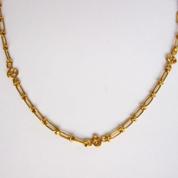 A Yellow Gold Melody Chain By Lucie Heskett-brem