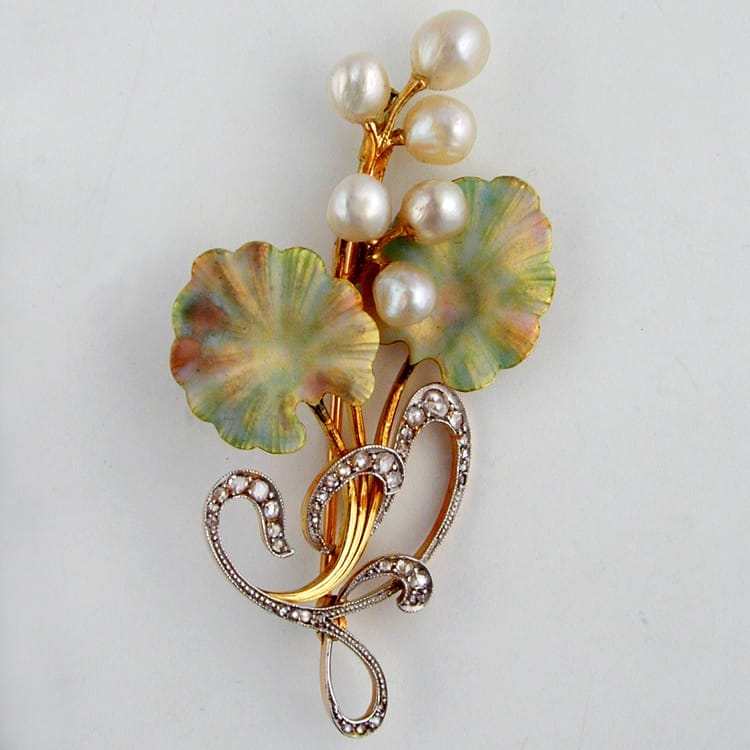 An Art Nouveau Enamel Pearl And Diamond Spray Brooch