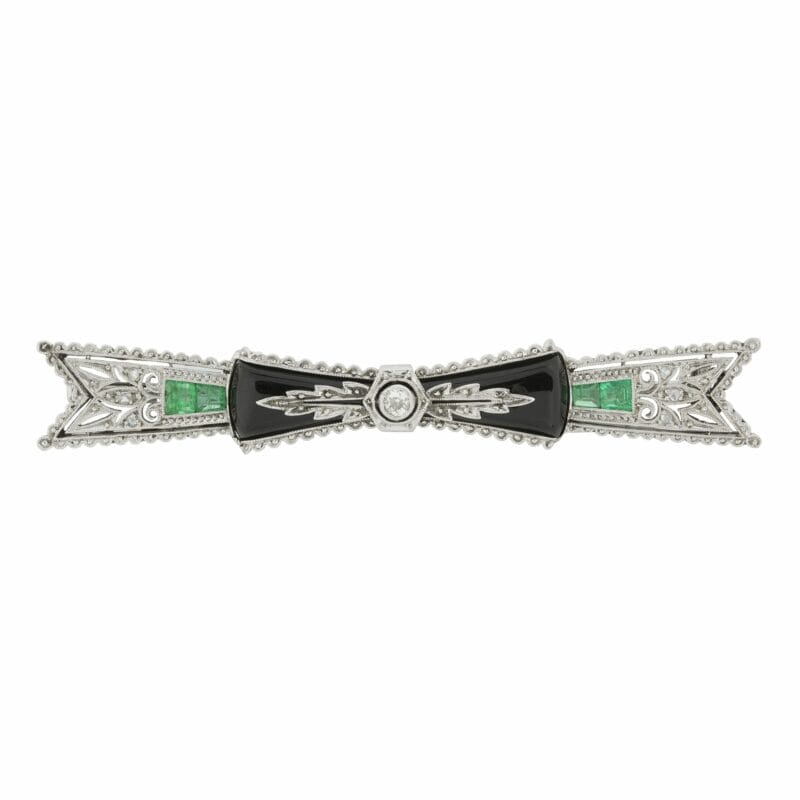 An Art Deco Onyx, Emerald And Diamond Pierced Bar Brooch