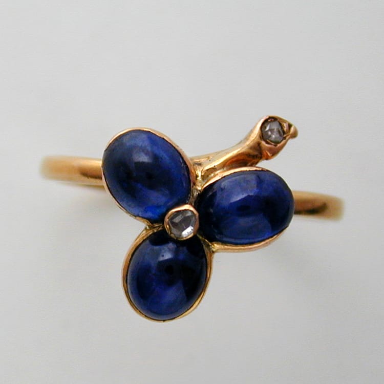 A Late Nineteenth Century Cabochon Sapphire Clover Leaf Ring
