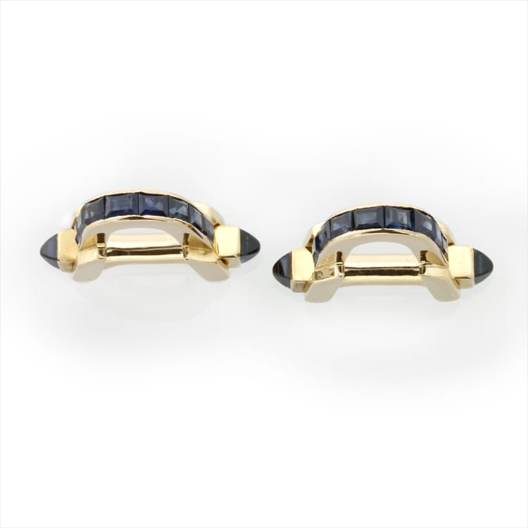 A Pair Of Sapphire And White Gold Stirrup Cufflinks
