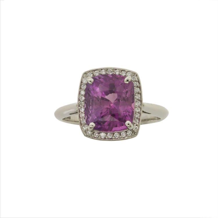 A Pink Sapphire And Diamond Cluster Ring