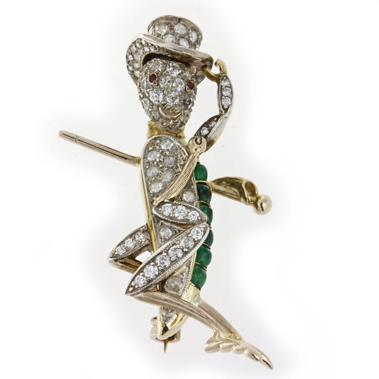 A Diamond And Emerald Cricket Brooch