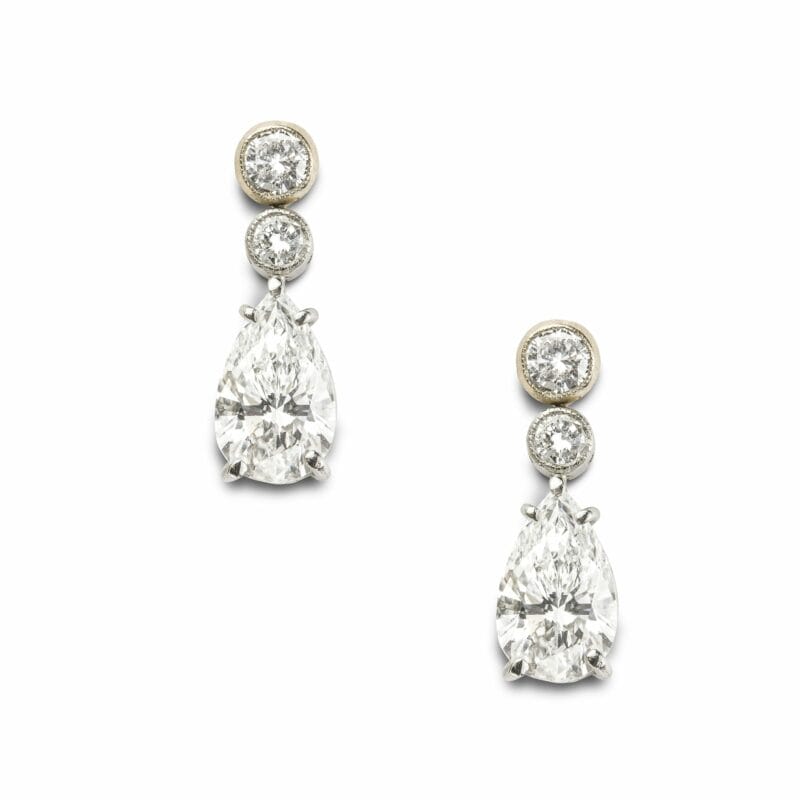 A Pair Of Pear Shaped Diamond Drop Earrings