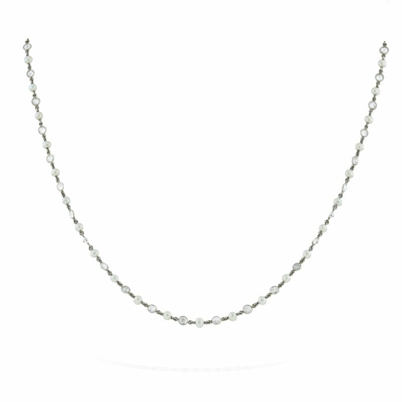A Platinum Diamond And Seed Pearl Chain