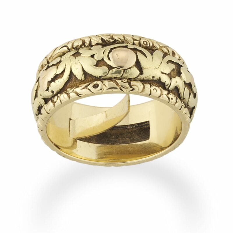 A Victorian Carved Gold Ring With Secret Compartment