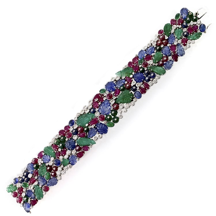 A Fine Wide Carved Gem-set Tutti-frutti  Bracelet
