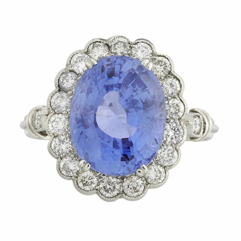 A Sapphire And Diamond Oval Cluster Ring
