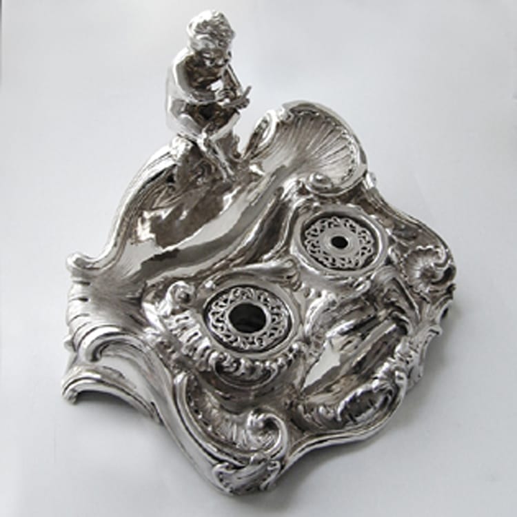 A Victorian Silver Ink Stand With Cherub