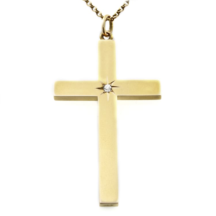 A Large Yellow Gold Cross With Diamond Centre