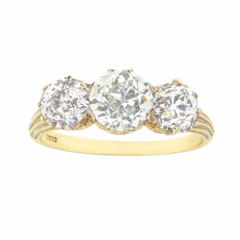 A Late Victorian Three Stone Old Brilliant-cut Diamond Ring