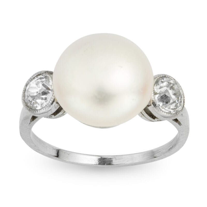 A Natural Pearl And Diamond Three Stone Ring