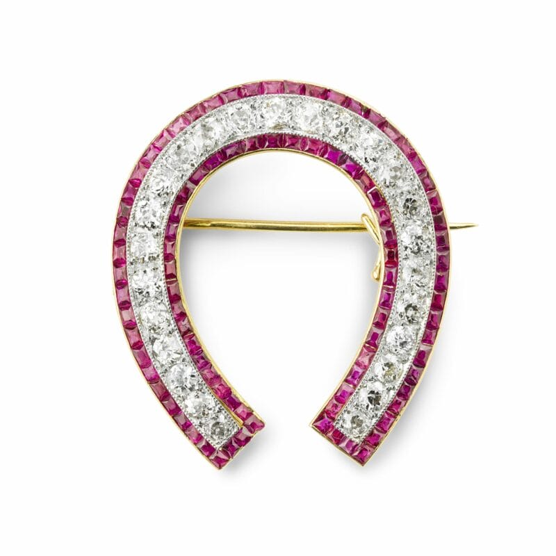 A Ruby And Diamond Horse Shoe Brooch