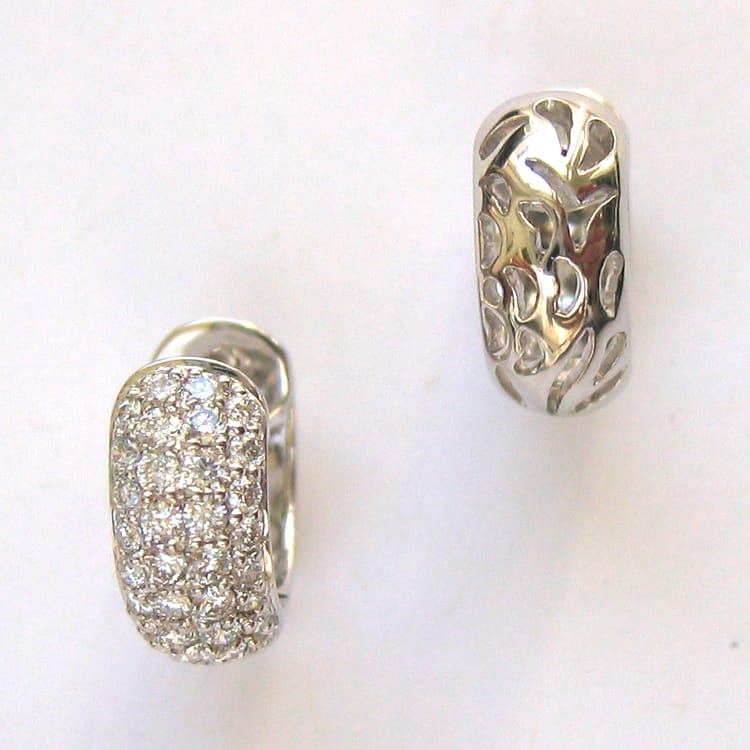 A Pair Of Diamond Set Earrings