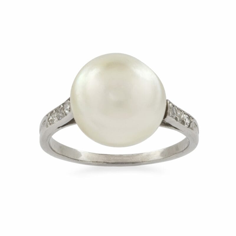 A Bouton Shaped Pearl Ring With Diamond Set Shoulders