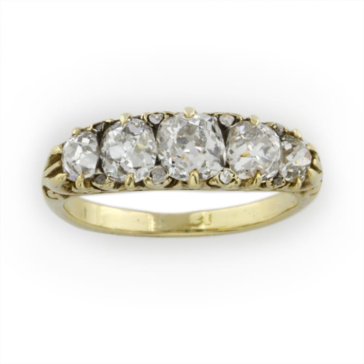 A Victorian Carved Half Hoop Five Stone Diamond Ring