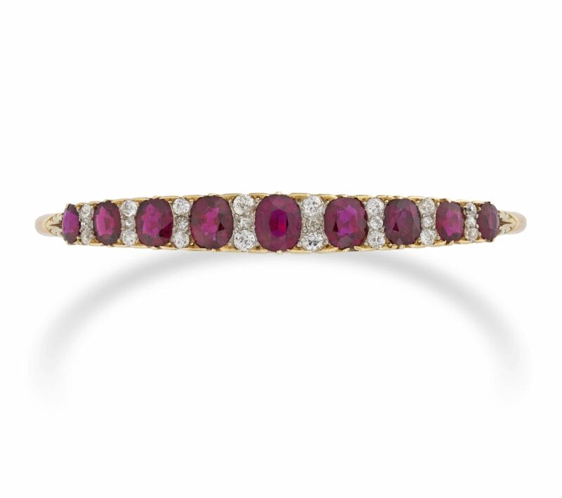 A Victorian Ruby And Diamond Carved Half Hoop Bangle