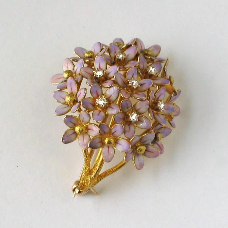 An Art Nouveau Lilac Enamel And Diamond Flower Spray Brooch