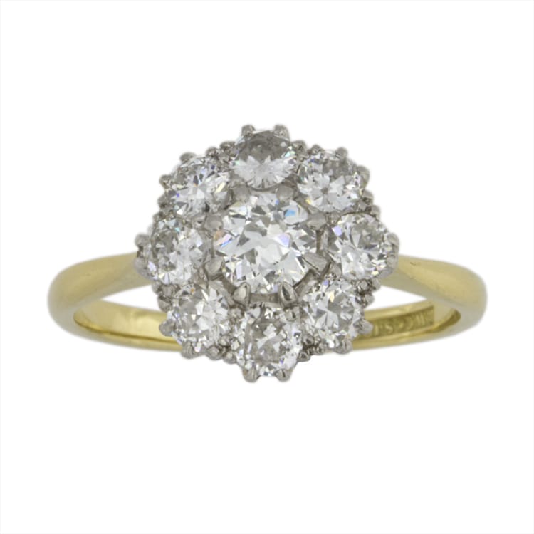 A Round Diamond Cluster Ring