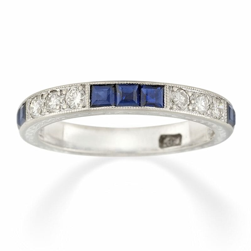 An Art Deco Sapphire And Diamond Half Eternity Ring