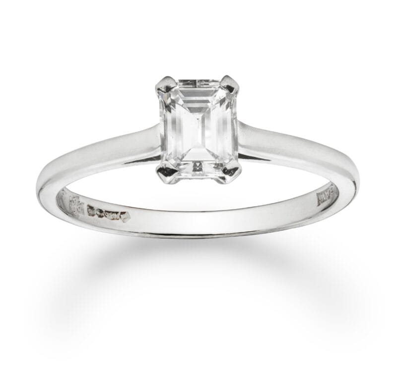 An Emerald-cut Solitaire Single Stone Diamond Ring