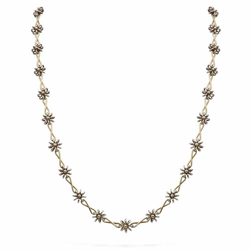 A Handmade Silver And Gold Necklace By Lucie Heskett-Brem