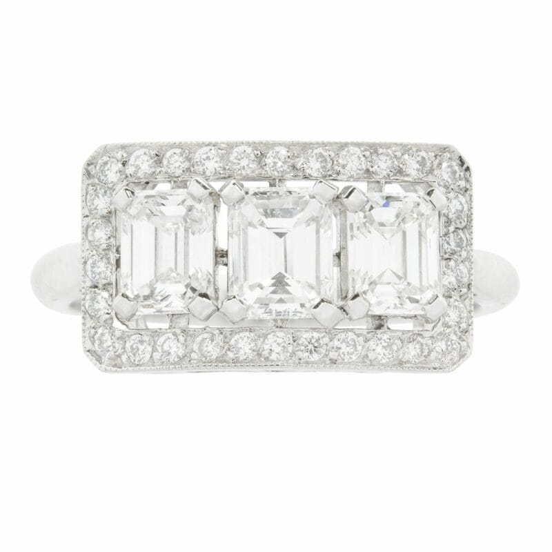 A Three Stone Emerald Cut Diamond Ring