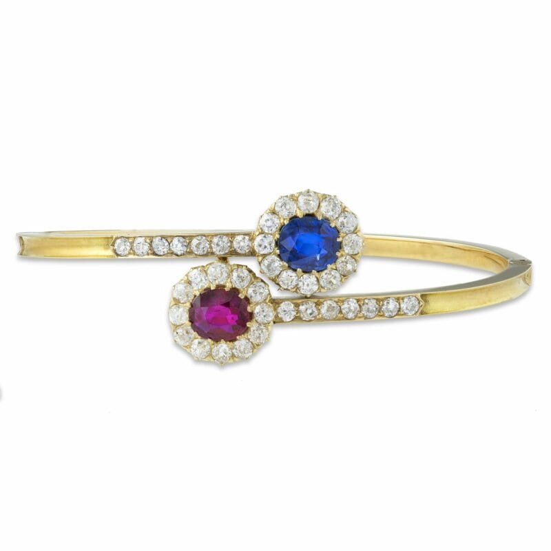 A Ruby And Sapphire Gold Bangle