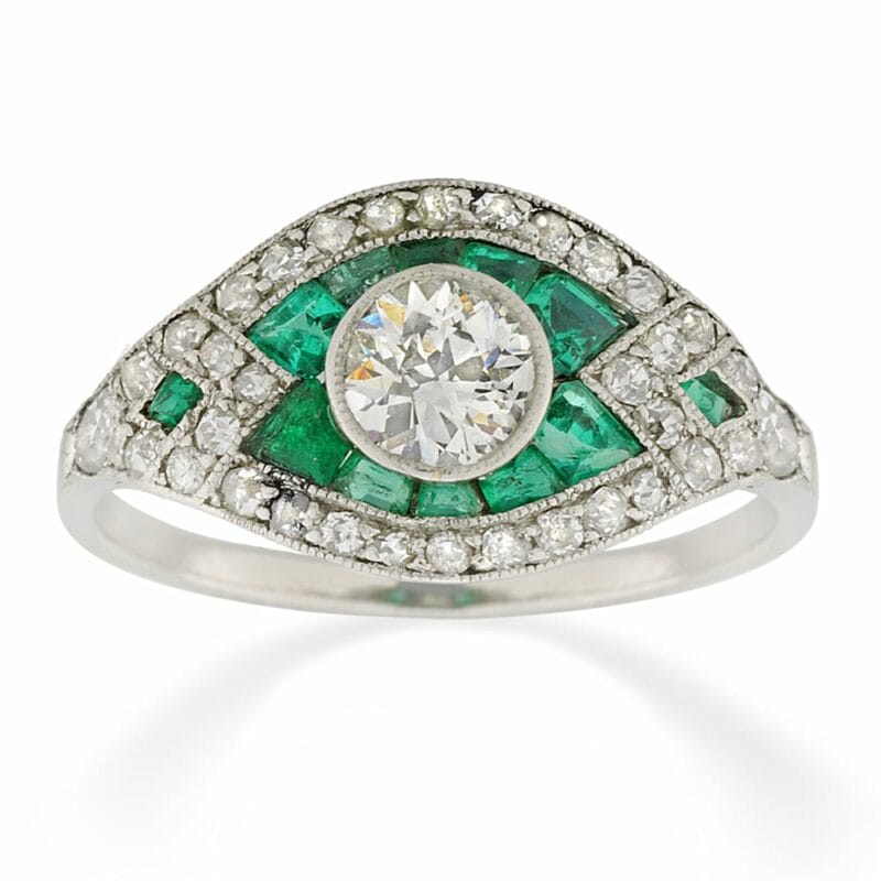 An Emerald And Diamond Cluster Ring