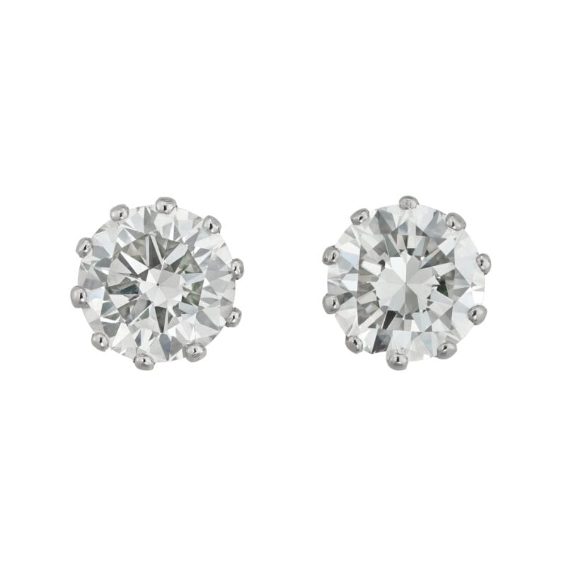 A pair of GIA certified diamond stud earrings