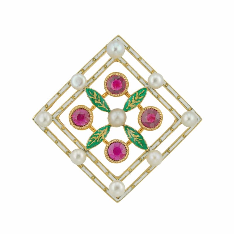 A Late Victorian Enamel Pearl And Ruby Brooch