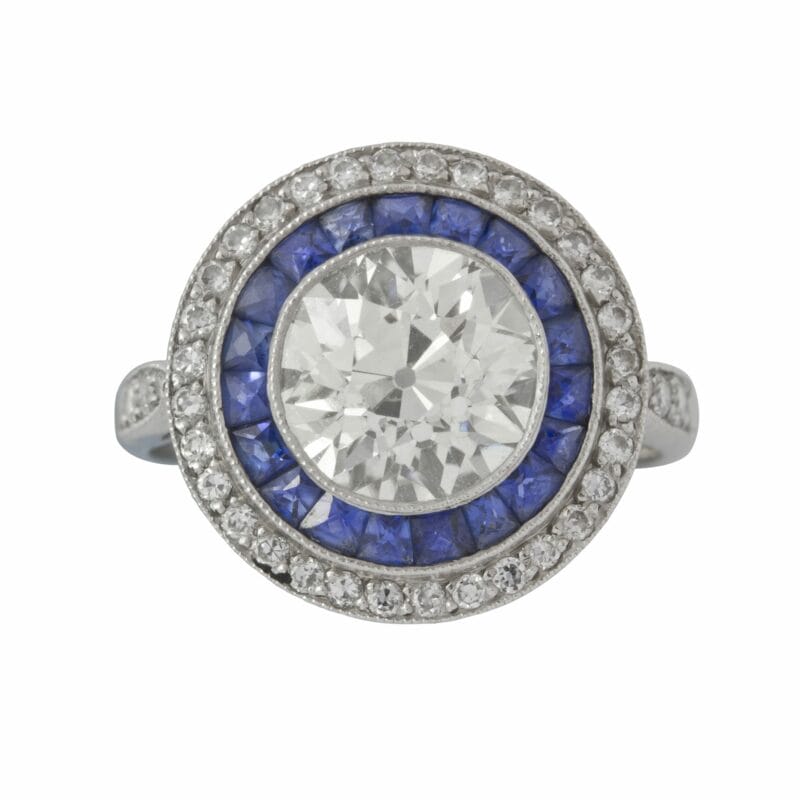 An Art Deco Diamond And Sapphire Target Ring