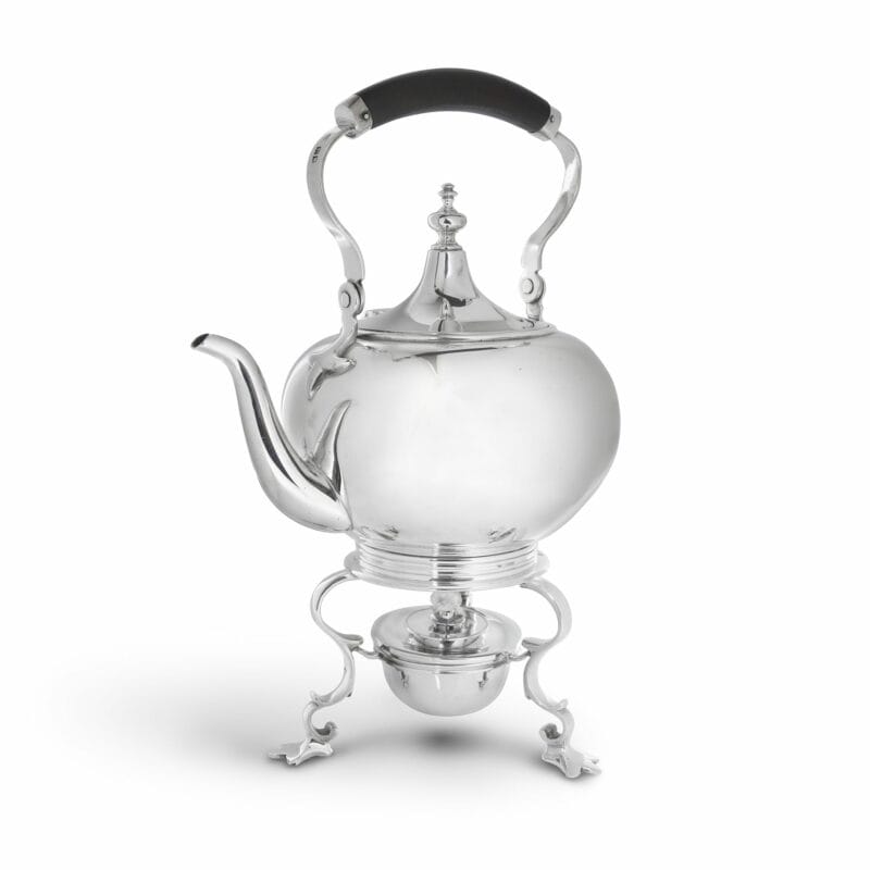 A Silver Kettle On Stand