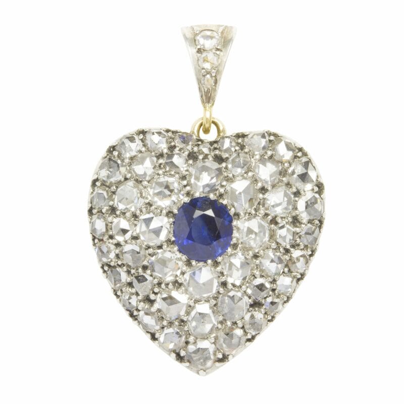 A Rose Cut Diamond And Sapphire In The Centre