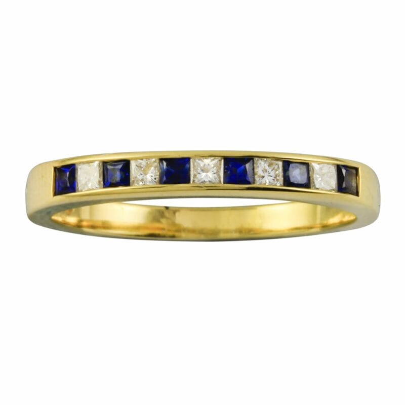 A Sapphire And Diamond Half Eternity Ring