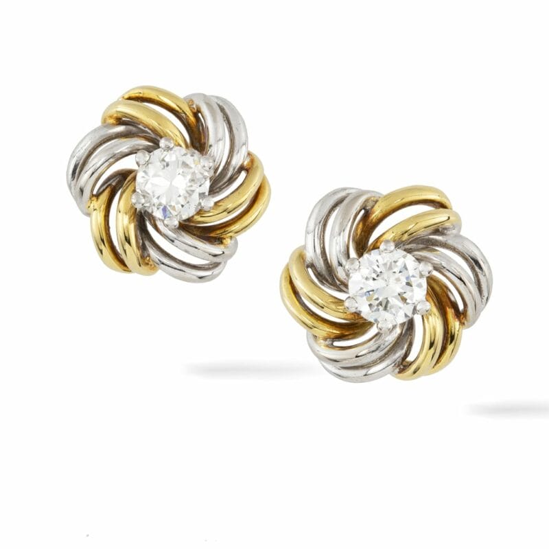 A Pair Of Diamond White And Yelow Gold Earrings