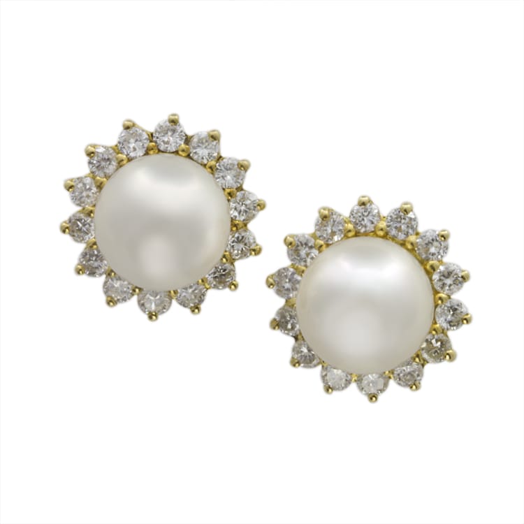 A Pair Of Pearl And Diamond Cluster Earrings