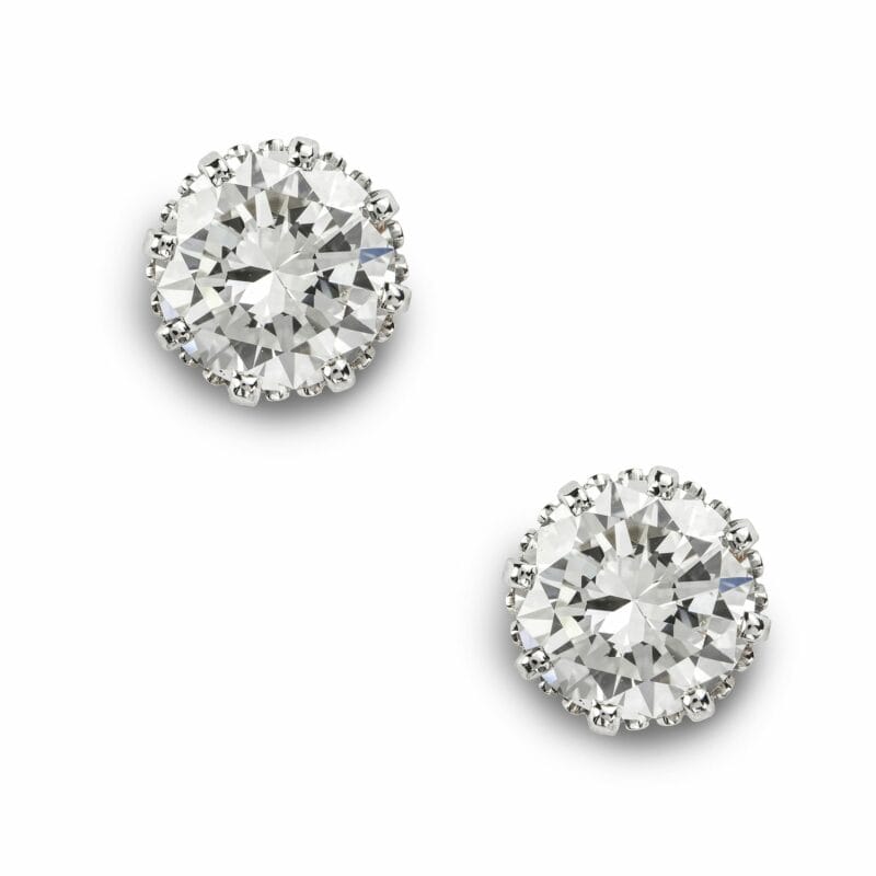 A Pair Of Round Brilliant Cut Diamond Stud Earrings