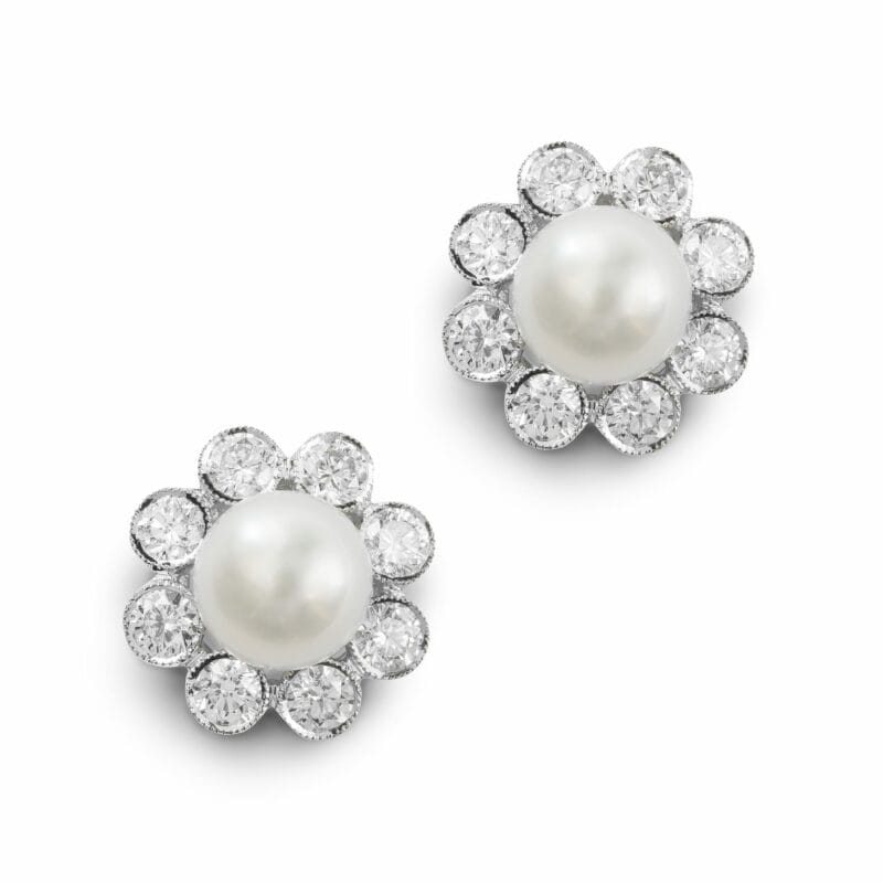 A Pair Of Pearl And Diamond Cluster Stud Earrings