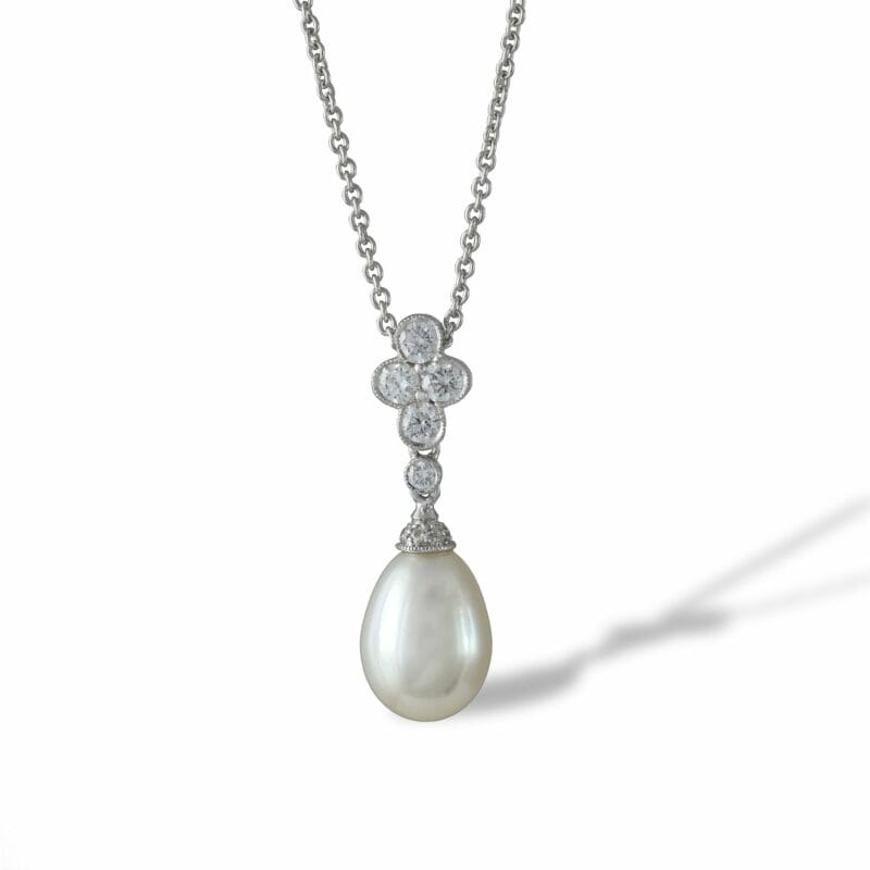 A Pearl And Diamond Drop Pendant With Chain
