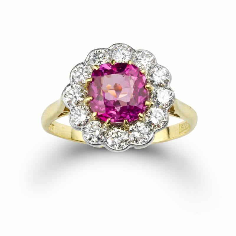 A Pink Sapphire And Diamond Cluster Ring