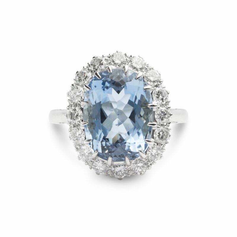An Aquamarine And Diamond Cluster Ring