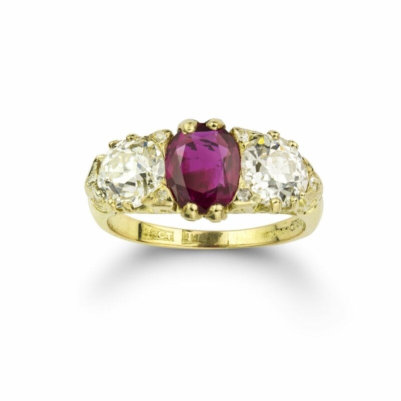 A Three Stone Ruby And Diamond Ring