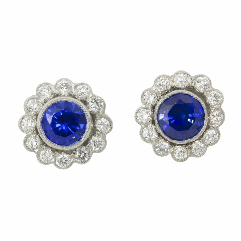 A Pair Of Sapphire And Diamond Cluster Stud Earrings