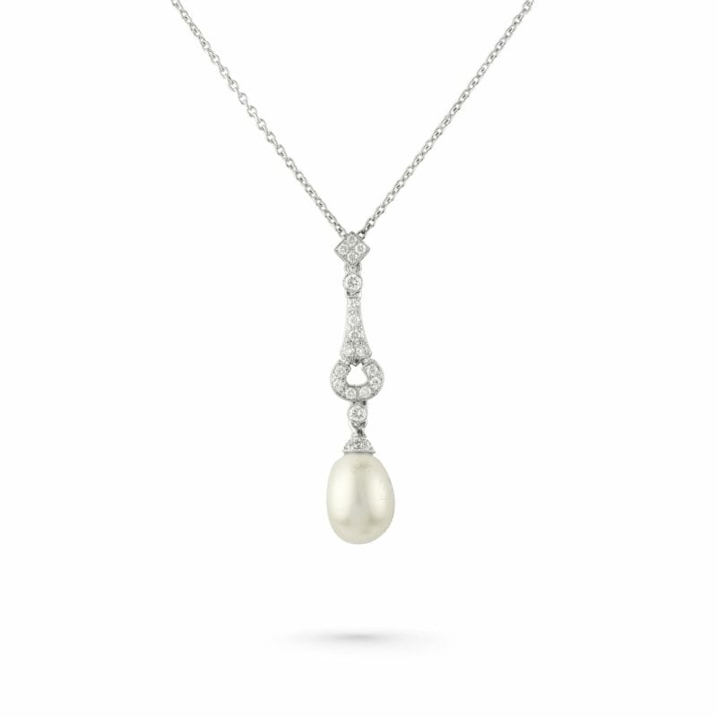 A Pearl And Diamond Pendant And Chain