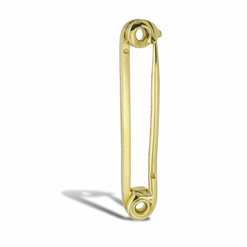 A Cartier Gold Tie Pin