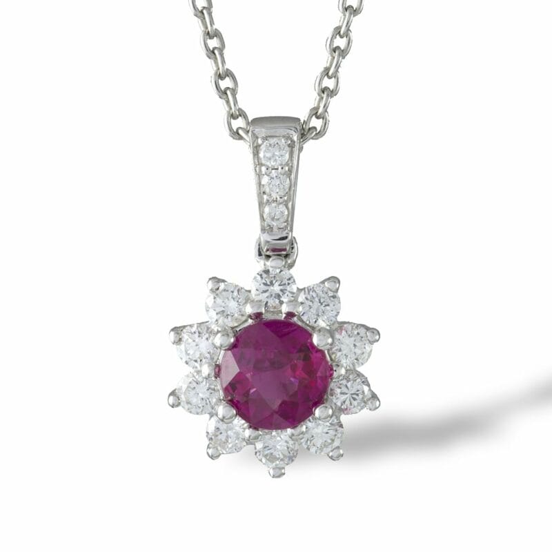 A Ruby And Diamond Cluster Pendant With Chain