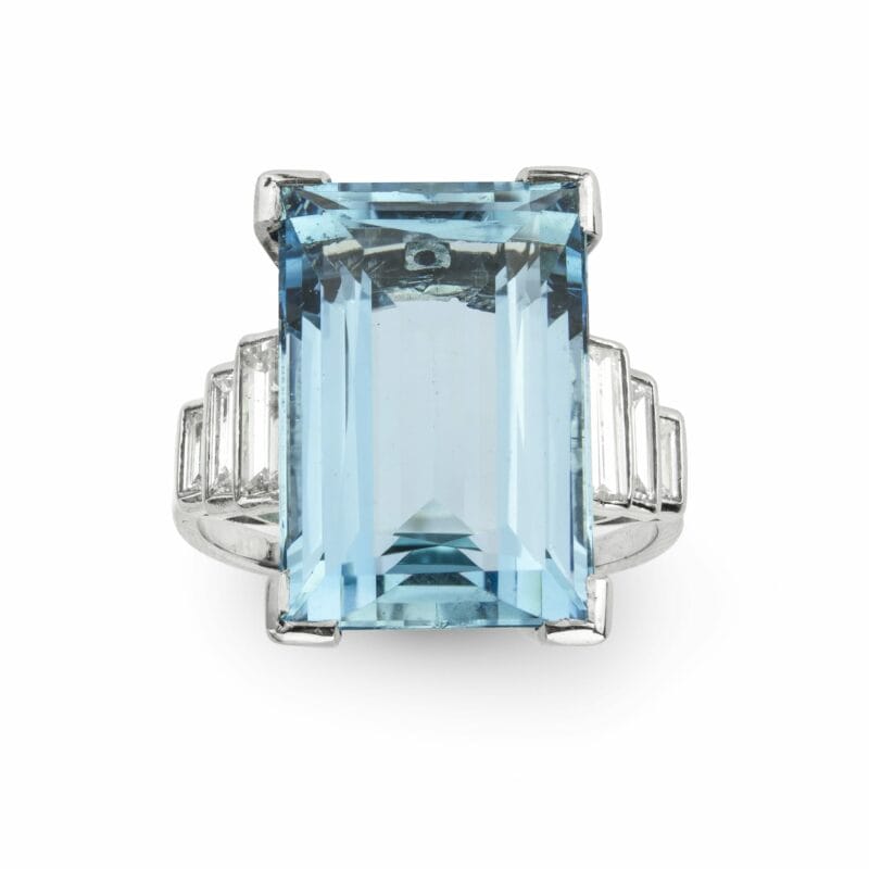 An Aquamarine Ring With Baguette Diamond Shoulders