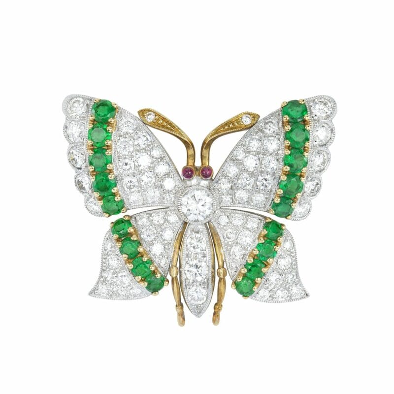 A Diamond And Emerald Butterfly Brooch